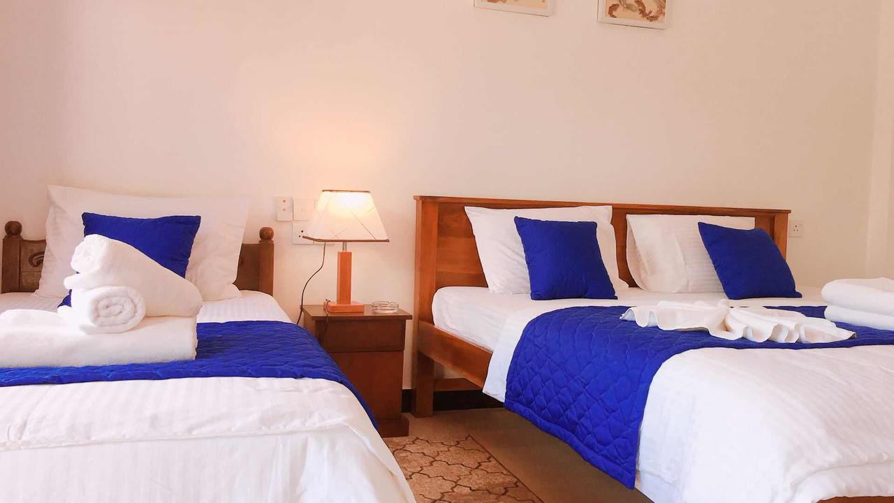 מיריסה Blue Whale Holiday Hotel מראה חיצוני תמונה