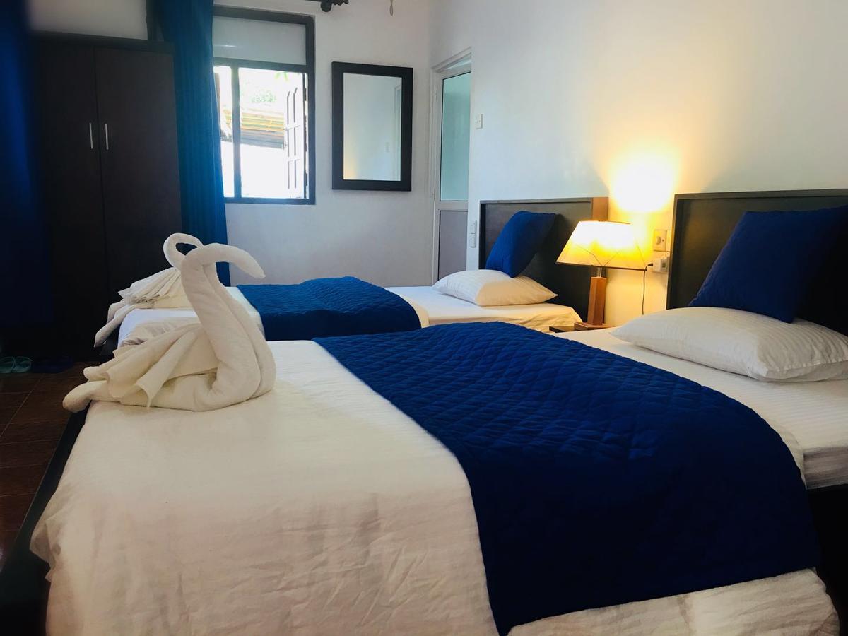 מיריסה Blue Whale Holiday Hotel חדר תמונה