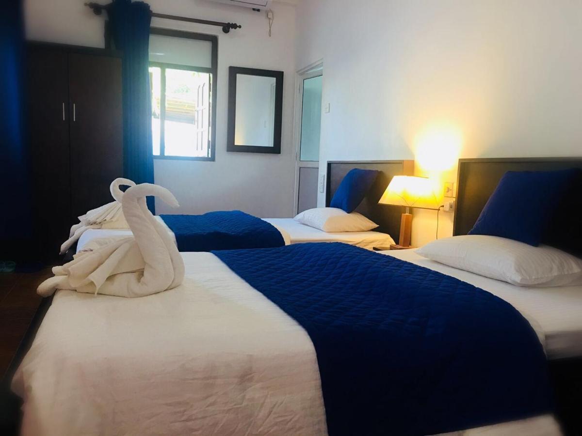 מיריסה Blue Whale Holiday Hotel חדר תמונה